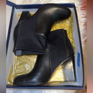 Black short dressy boots.